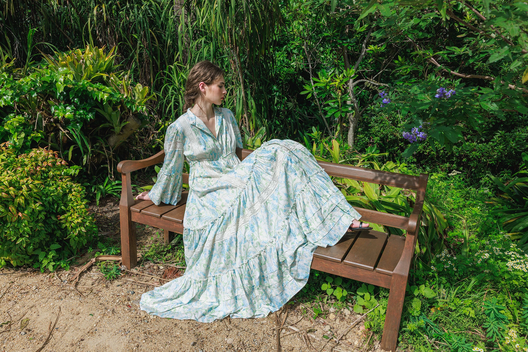 Model wears Zedsea bleeding hearts blue floral maxi dress